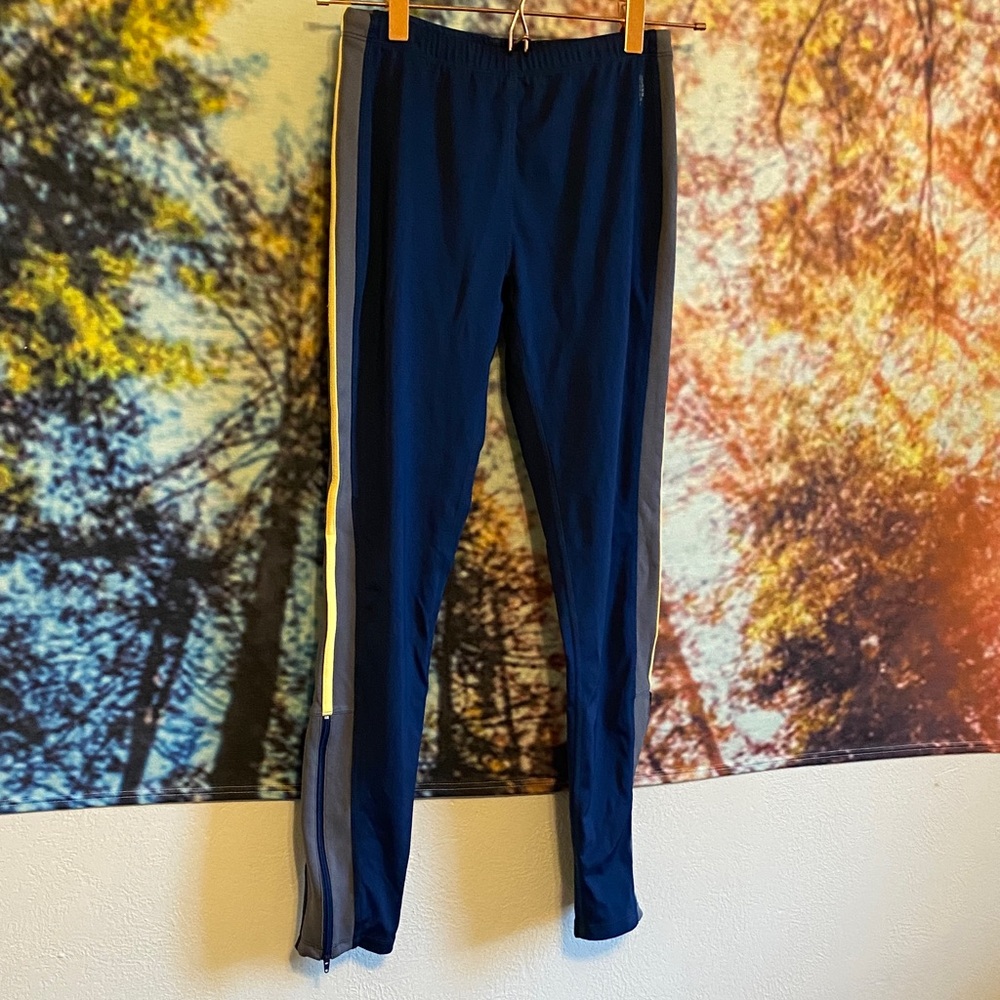 FP Movement by Free People like new Navy Leggings with yellow and gray Stripes